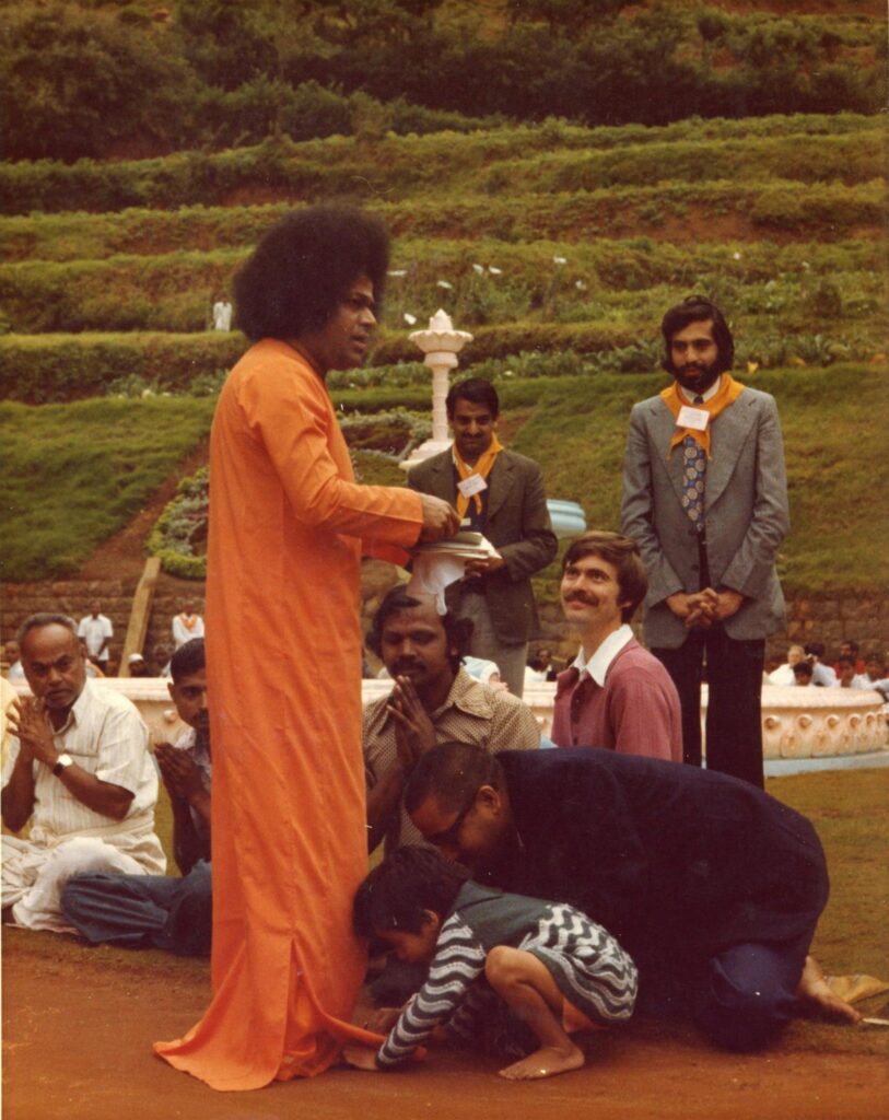 HandicraftStore Sai Baba Sitting on Rock with White Clothes and Lord Brahma,  Vishnu, Mahesh Sai Baba